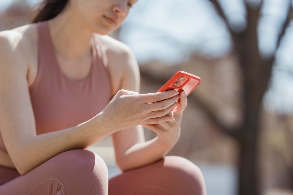 A person using a health app on a smartphone